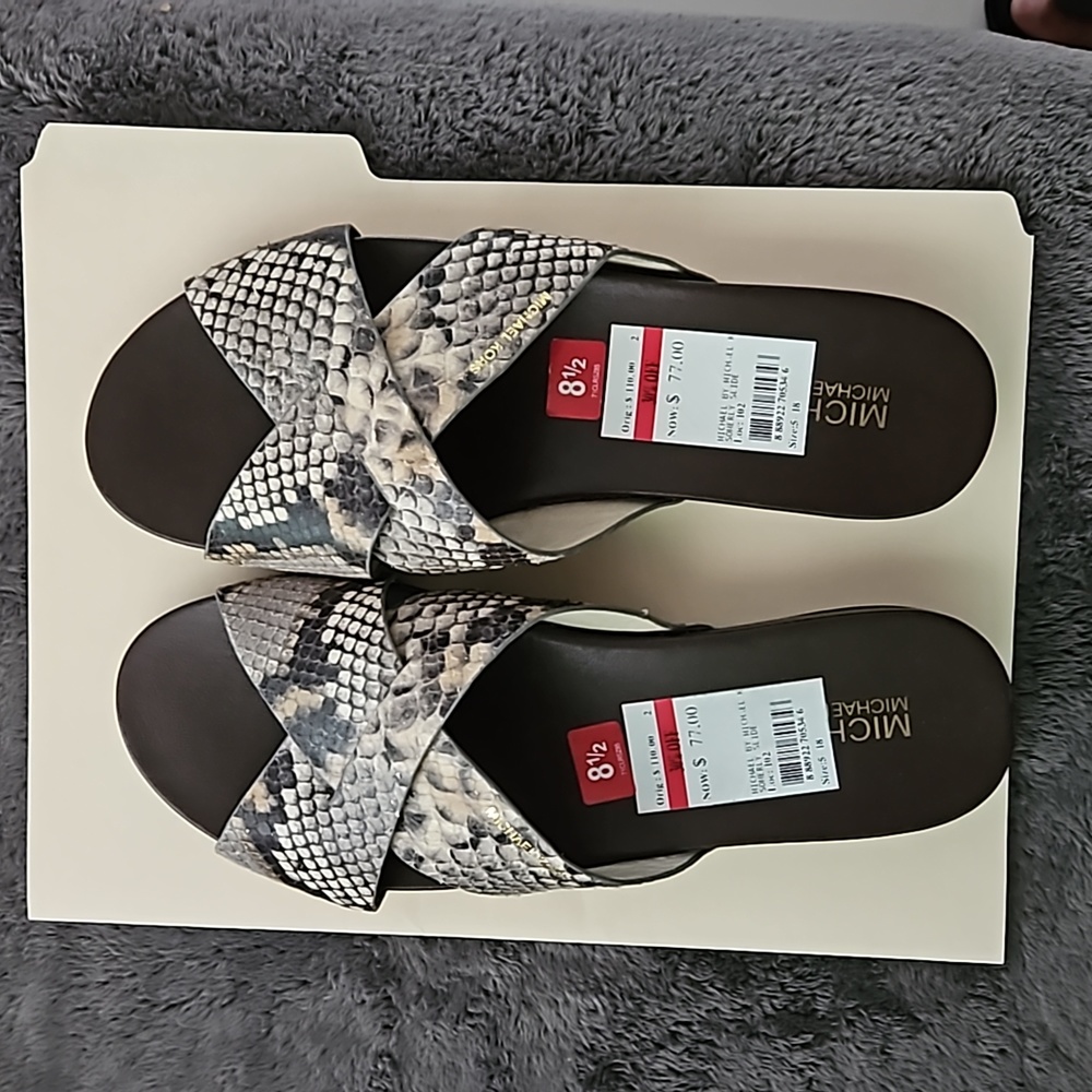 Michael Kors size 8.5 snake print  leather slippers.